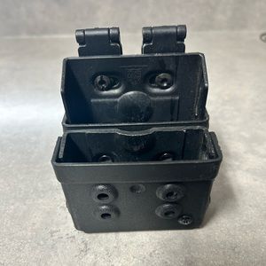 Zero9 holsters double kydex handcuff case with Molle locks.